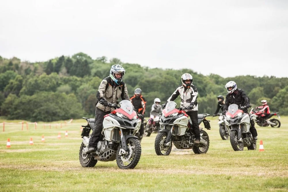 Motorcyclists enjoying the Ducati off-road school at the Adventure Bike Rider Festival