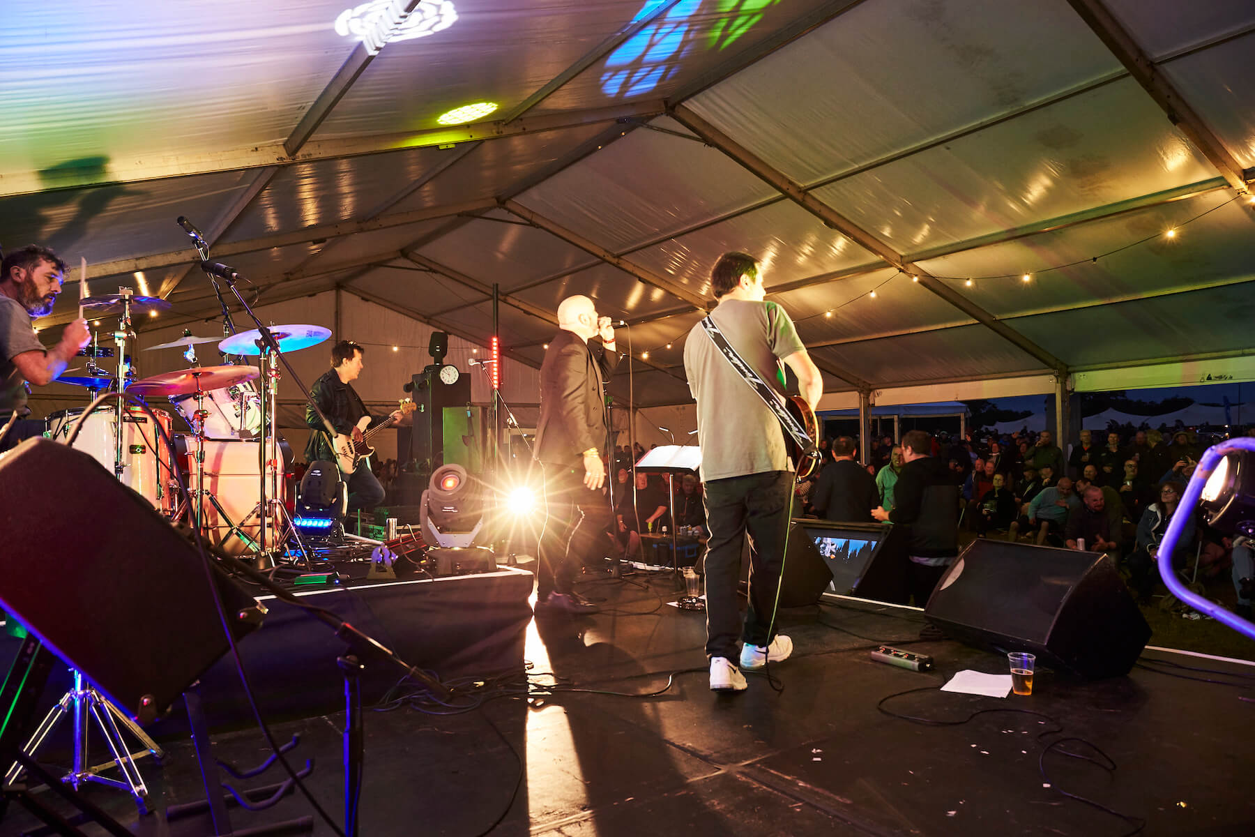 festival-music Live rock band plays on the main stage at the Adventure Bike Rider Festival