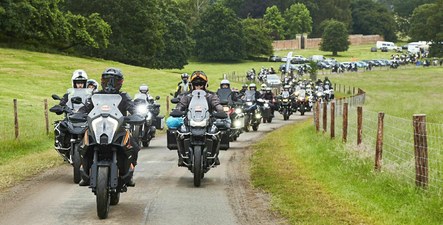 A group of motorcyclists ride in the Ragley Hall Estate