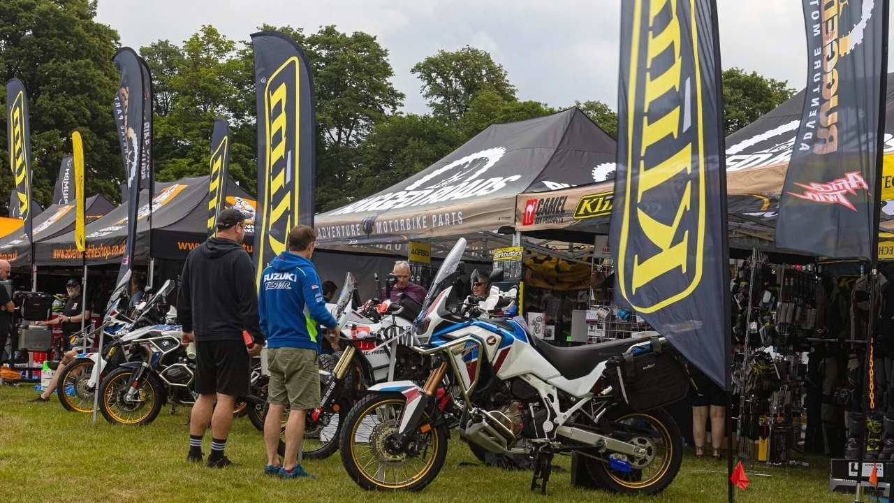 4 Two motorcyclists looking at motorbikes at the ABR Festival