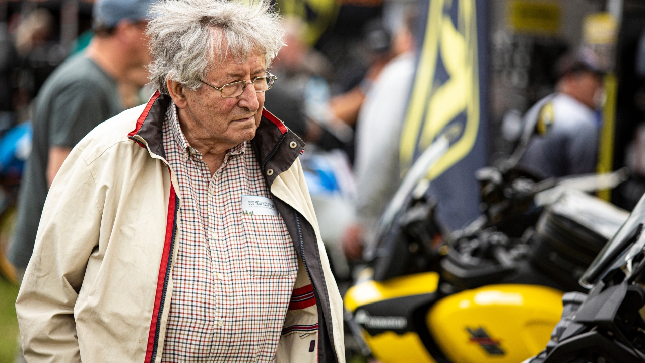Ted Simon looking at motorcycles at the 2022 ABR Festival