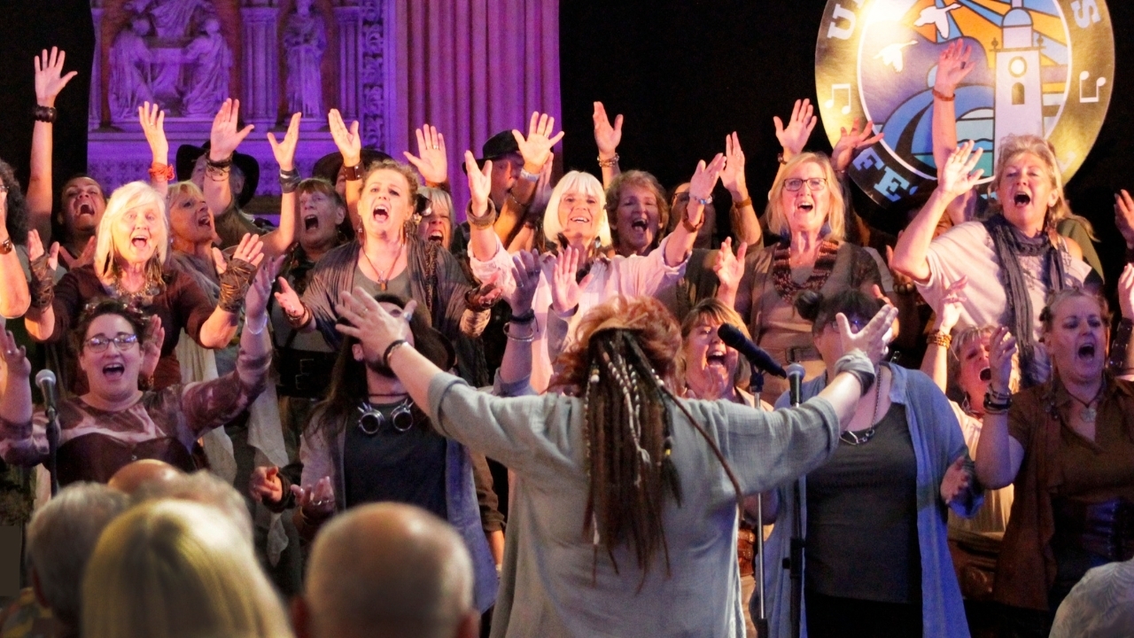 A group of singers for Voices Unlimited on stage