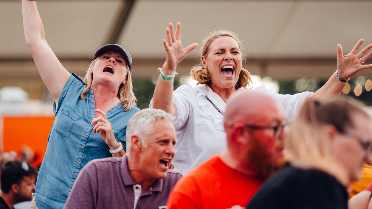 14 Two female visitors at the ABR Festival enjoying the live music