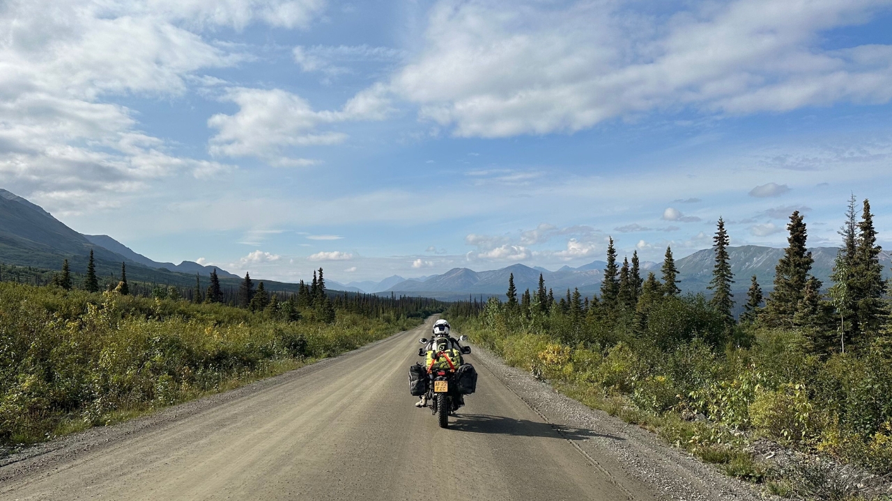 Motorcyclist riding in Alaska